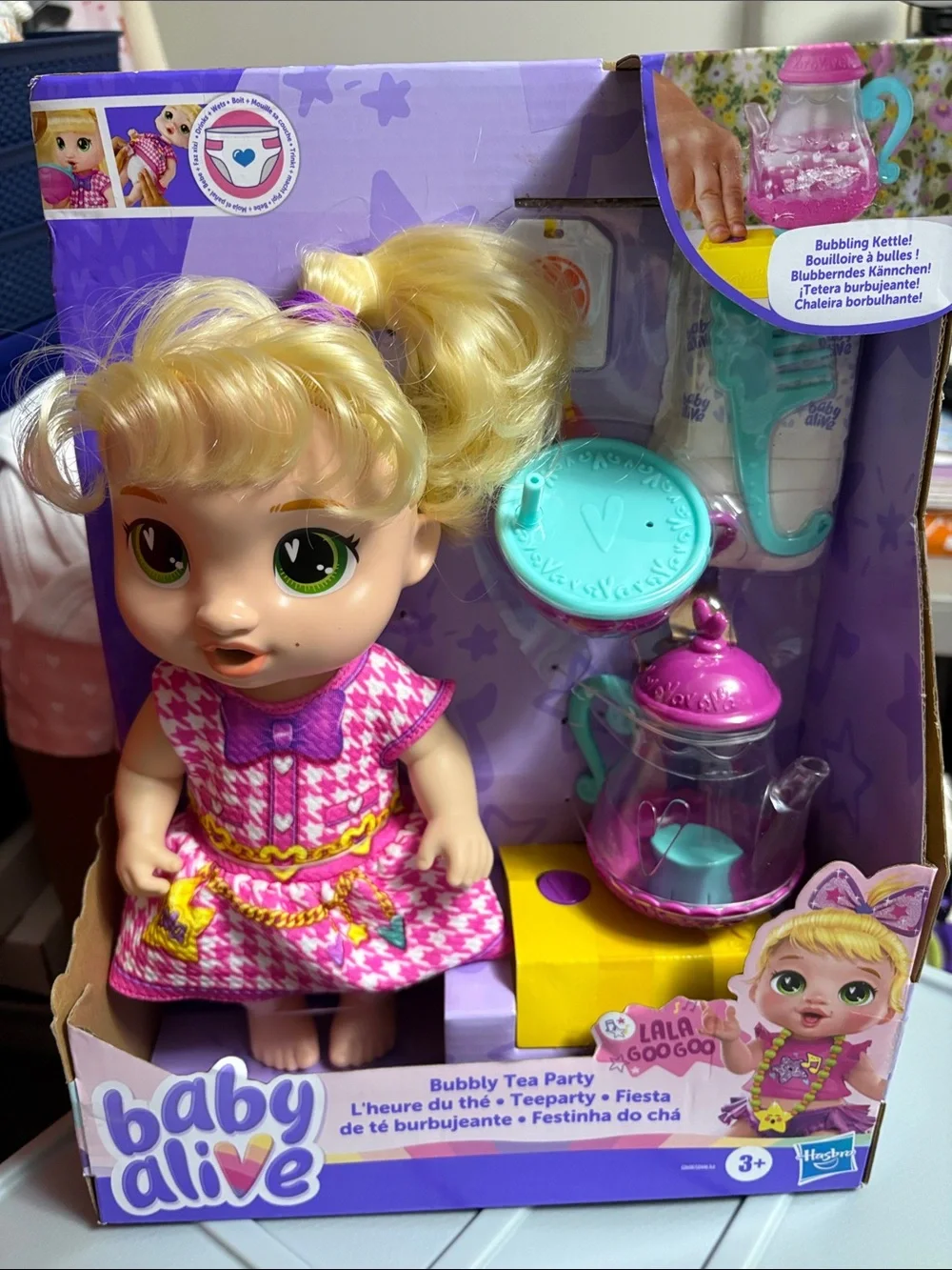 Hasbro Baby Alive Doll with Pink Dress, Purple Trim & Teal Tea Set